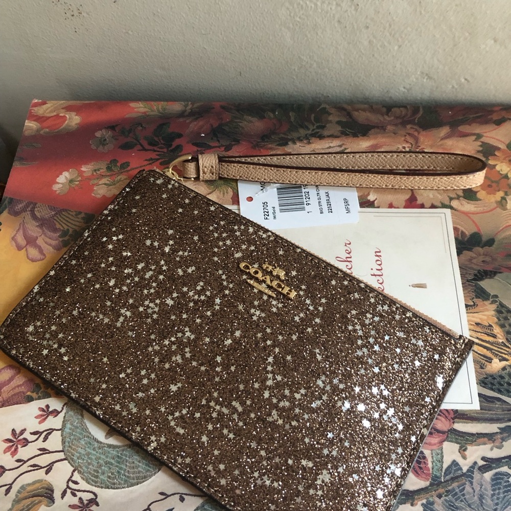 NWT Coach Metallic sparkle star Gold Wristlet - leather, brand new in box